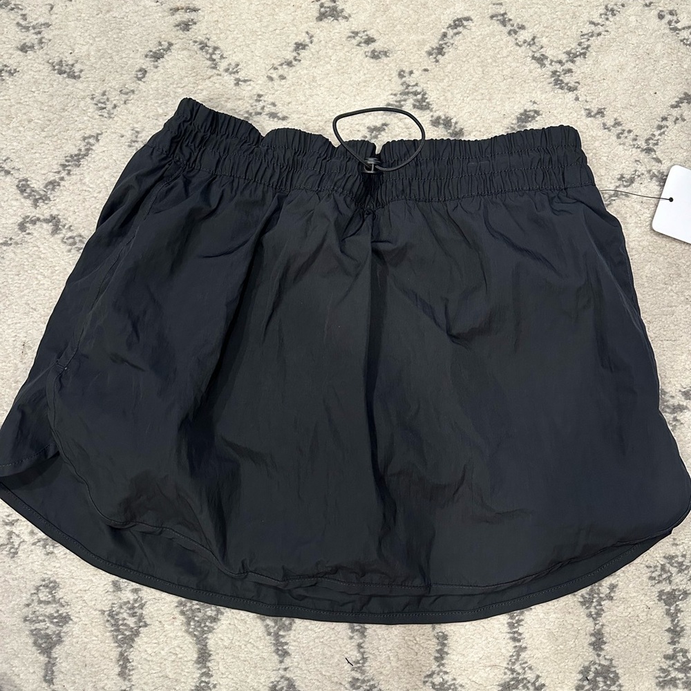 NEW with Tags. Yogalicious Black Skort. Size Medium
